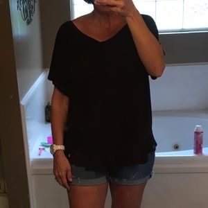 Oversized black v-neck top